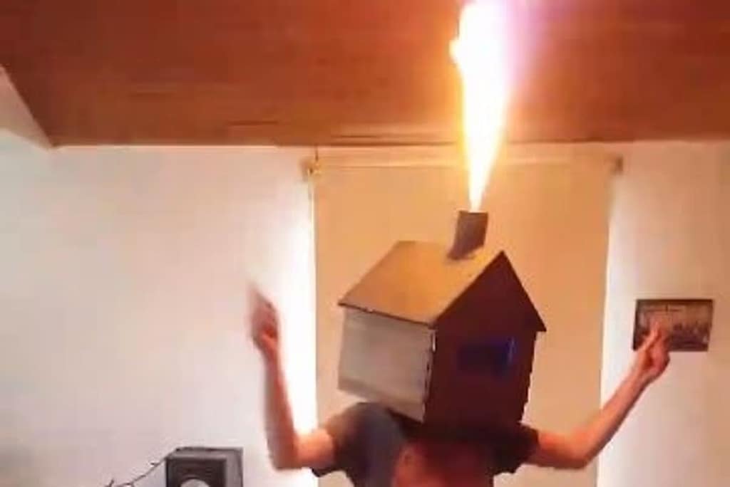 Bizarre Shed News, man with shed on his head
